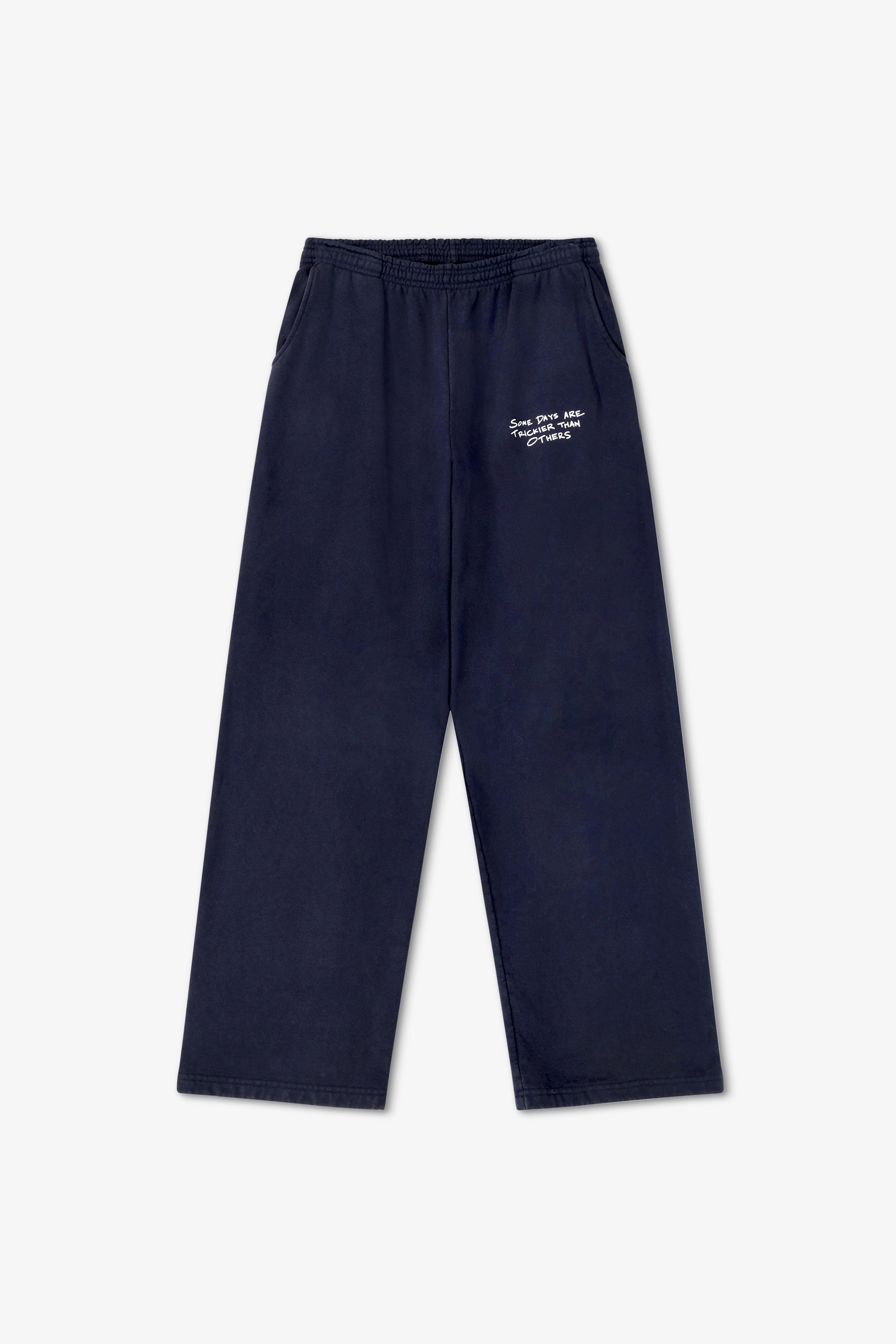 Navy blue pants with a small white logo on a white background