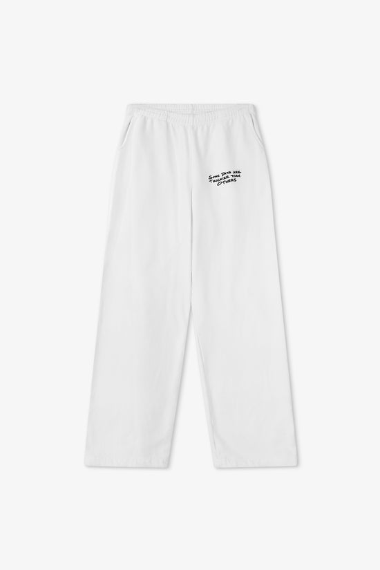White sweatpants with text on a white background