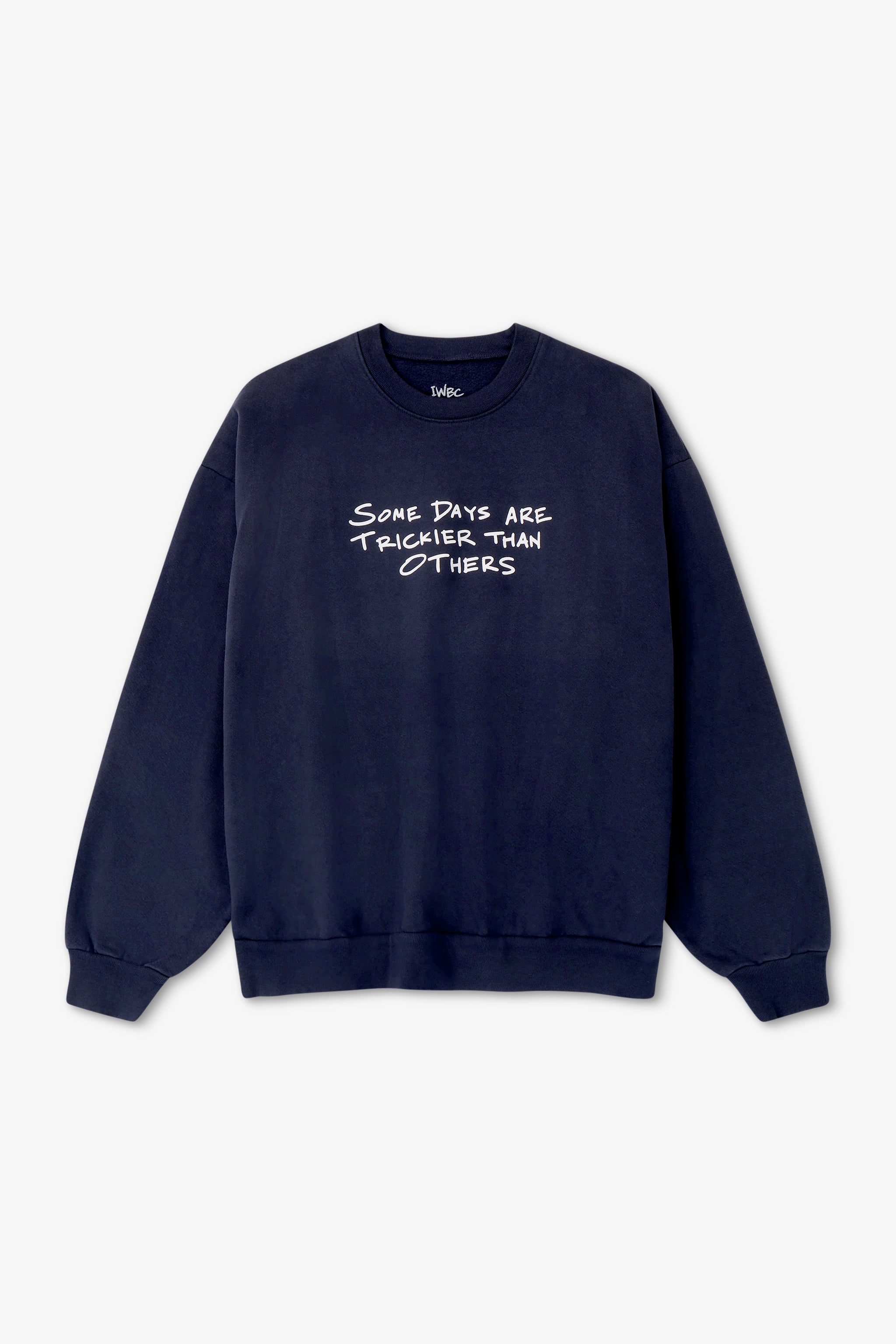 Navy blue sweatshirt with white text on a light gray background